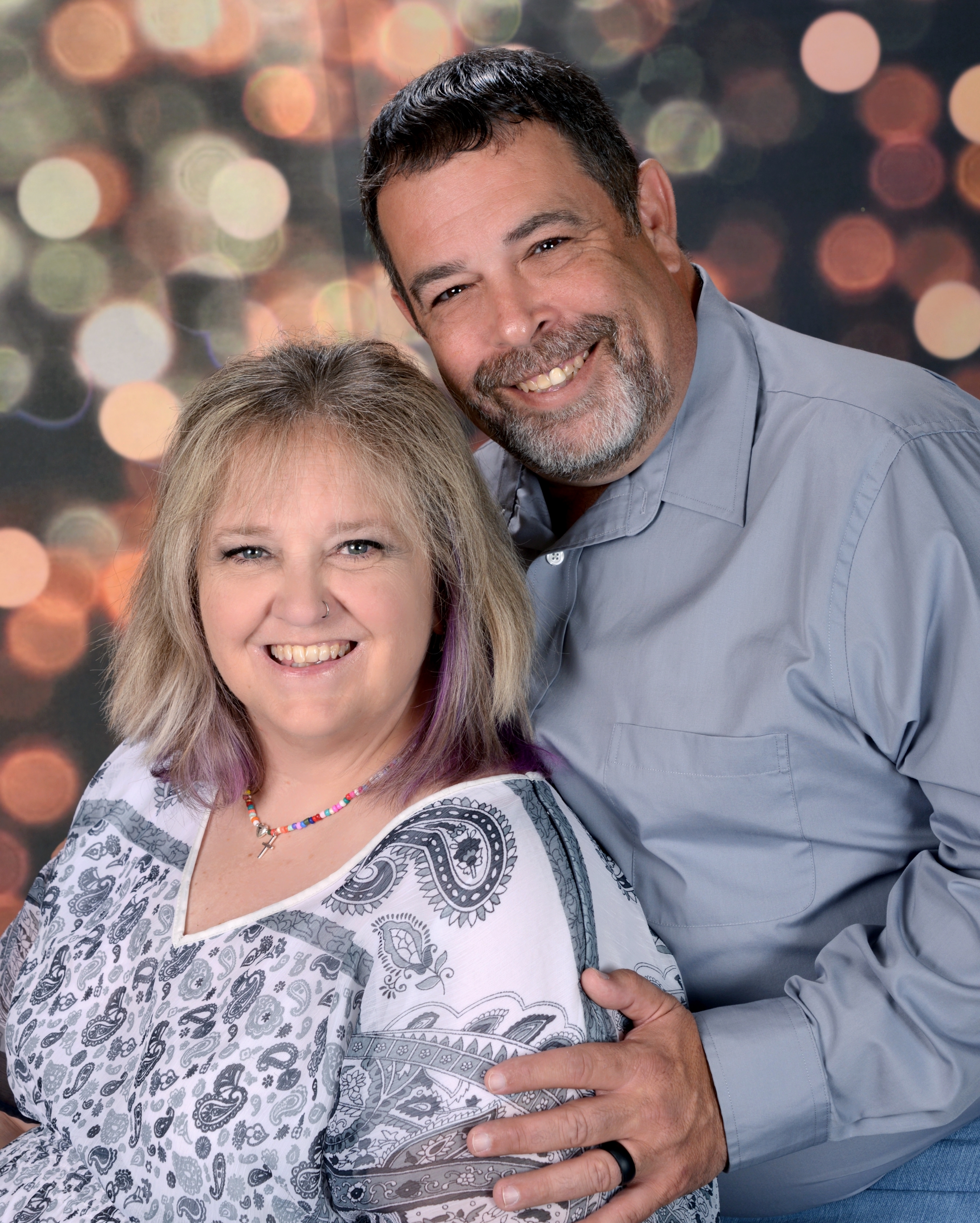 A smiling couple posing together